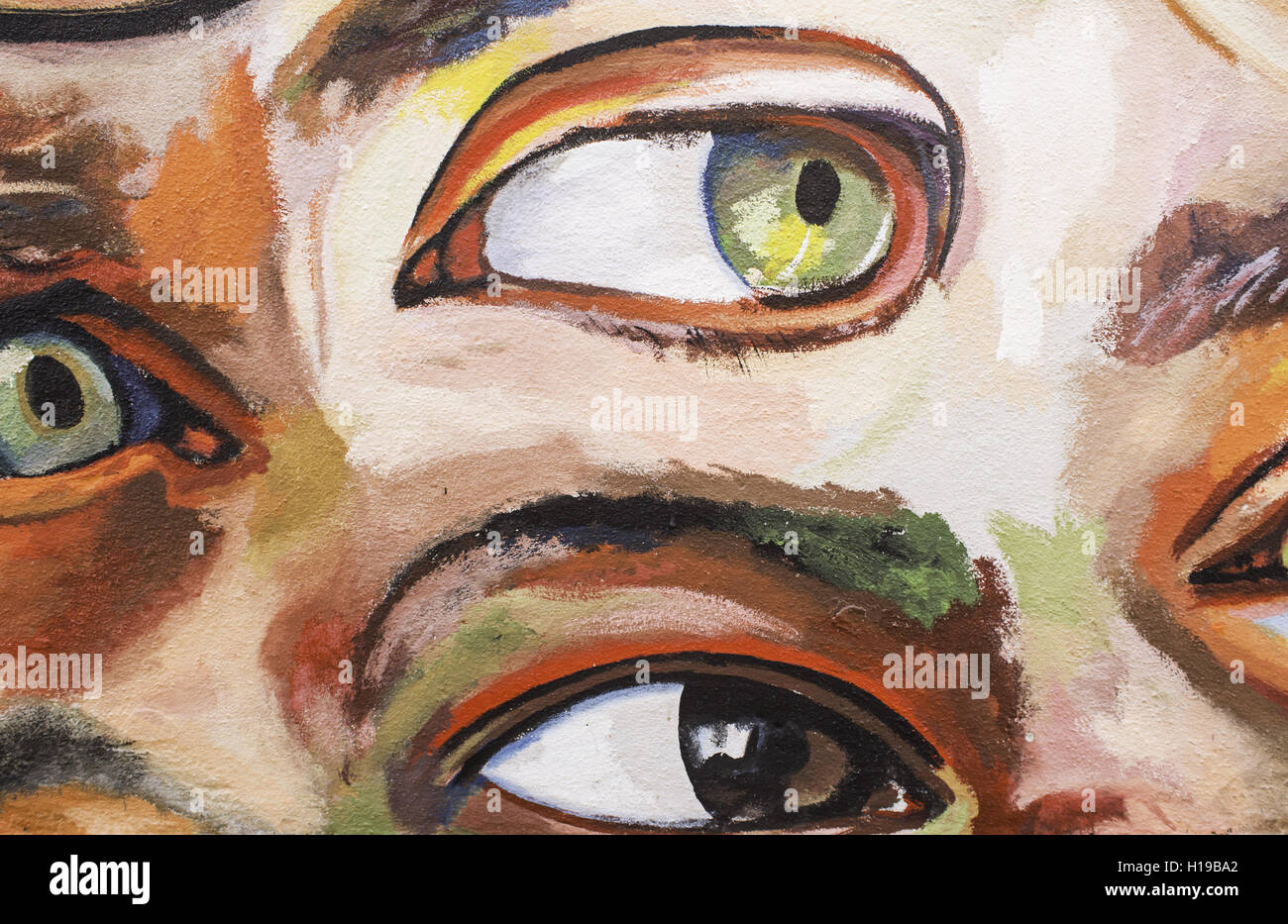 Des yeux verts urbains peint sur mur, rechercher Banque D'Images