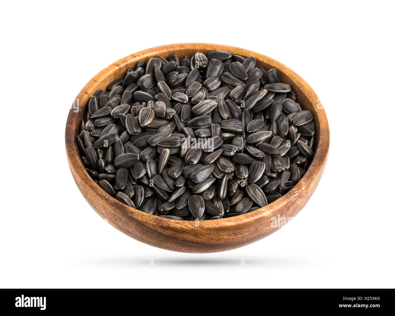 Les graines de tournesol noires isolé sur blanc, vue d'en haut Banque D'Images