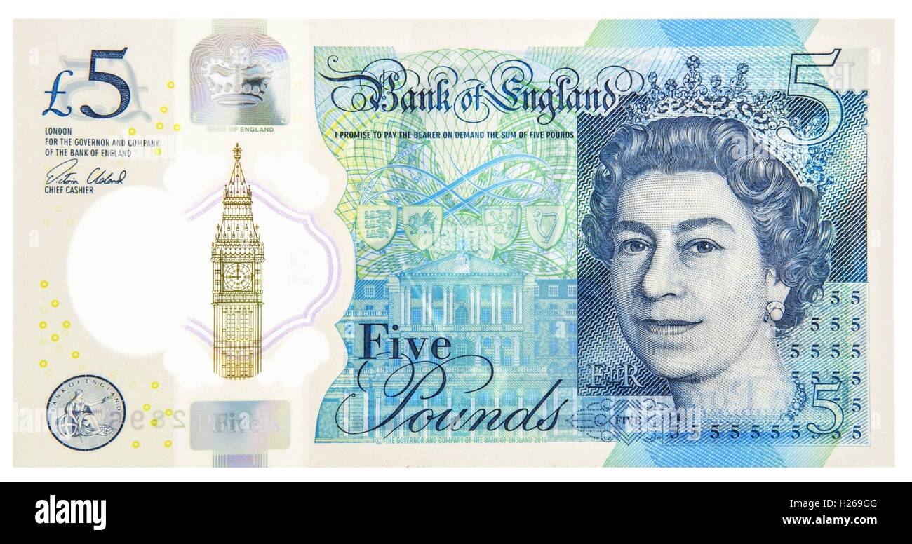 Le polymère nouveau UK 5 Pound note avec Winston Churchhill sur fond blanc Banque D'Images