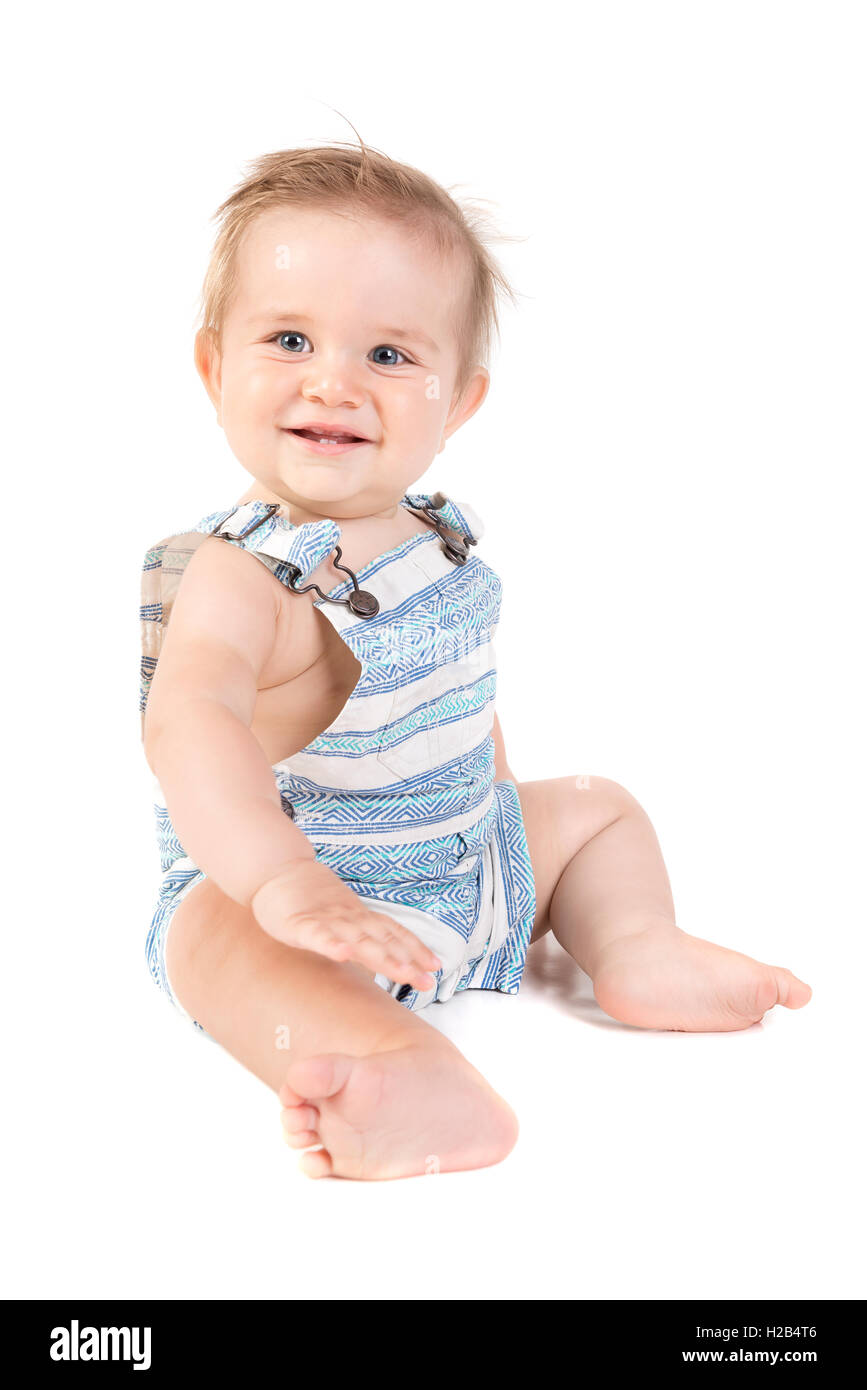 Beau Bébé posant isolé en fond blanc Banque D'Images