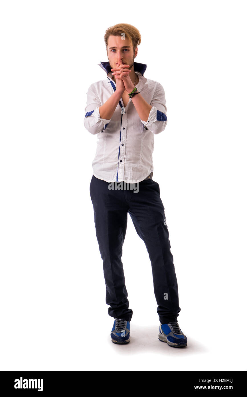 L'indigent, jeune homme désespéré implore les mains jointes comme si priant à huis clos, isolés Banque D'Images