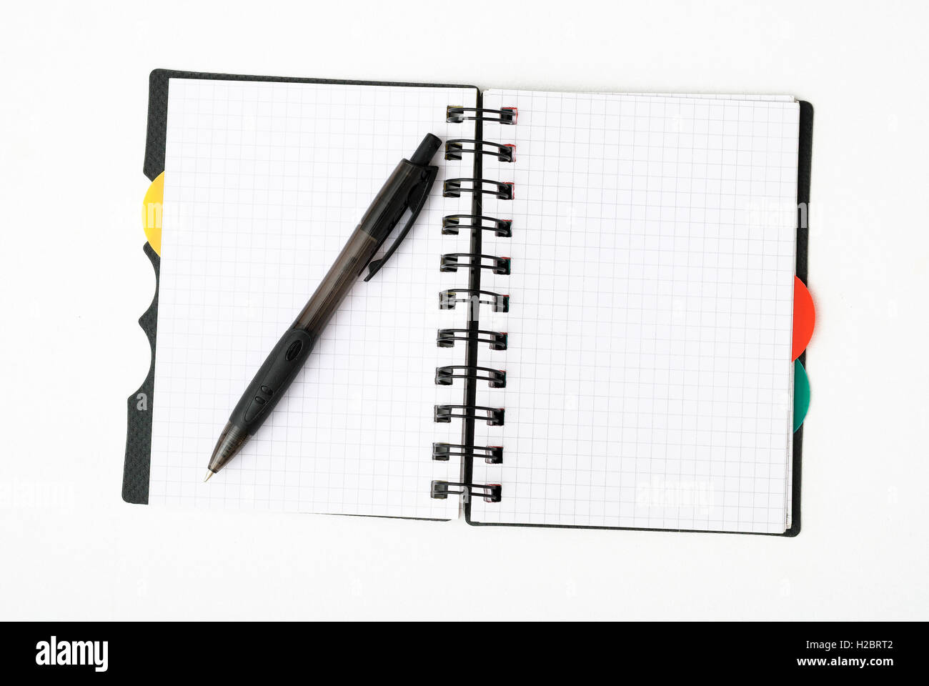 Le bloc-notes avec stylo isolated Banque D'Images
