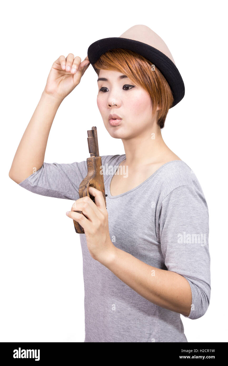 Portrait of asian woman avec pistolet jouet Banque D'Images
