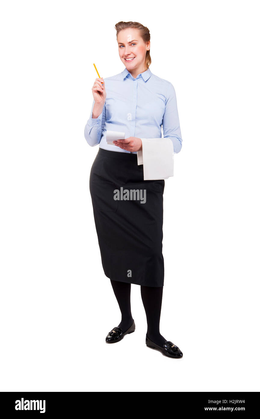 Femme en uniforme de serveur en prenant l'ordre, Smiling, isolé sur fond blanc. Banque D'Images