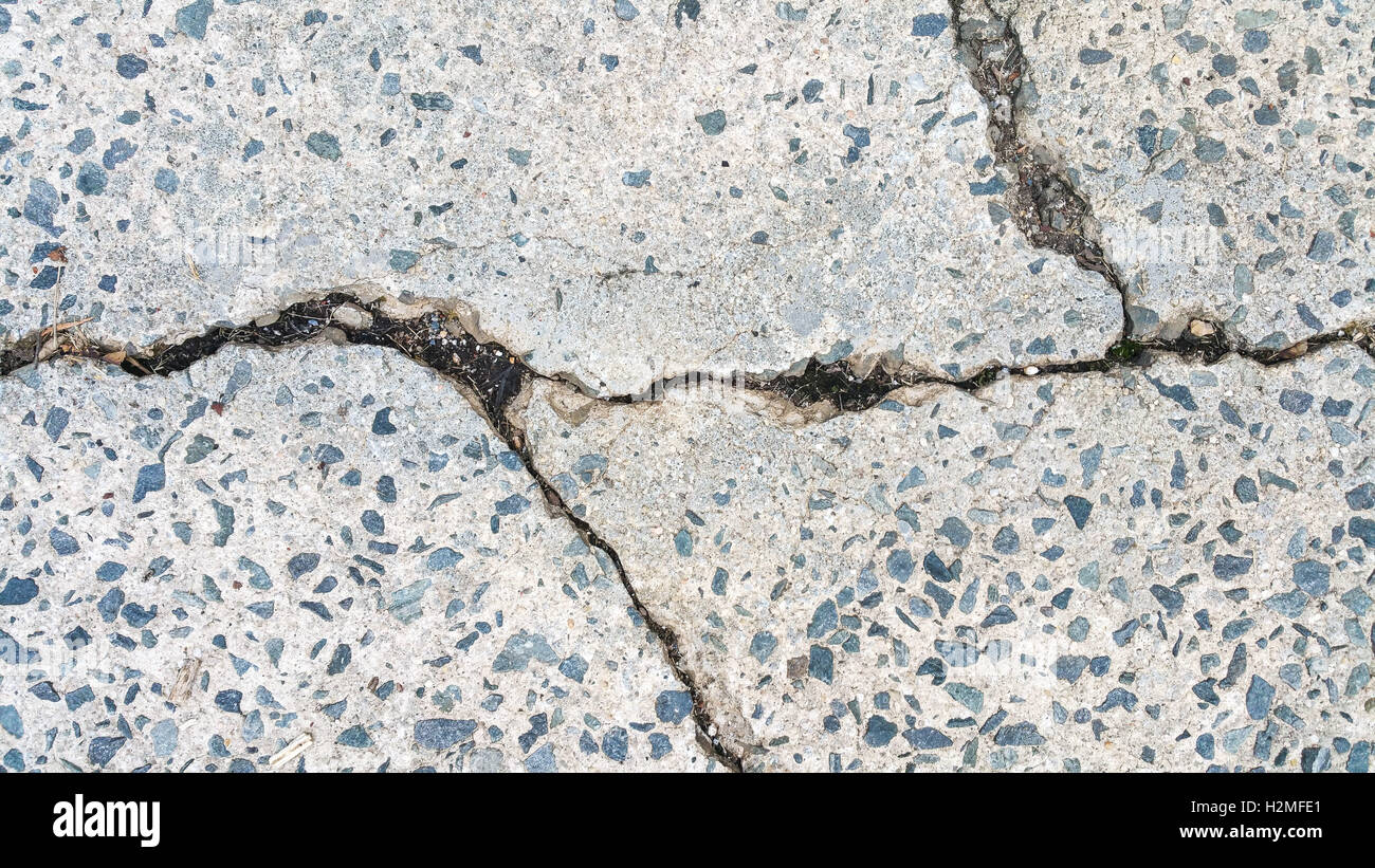 Béton fissuré et altérés pour le fond Banque D'Images