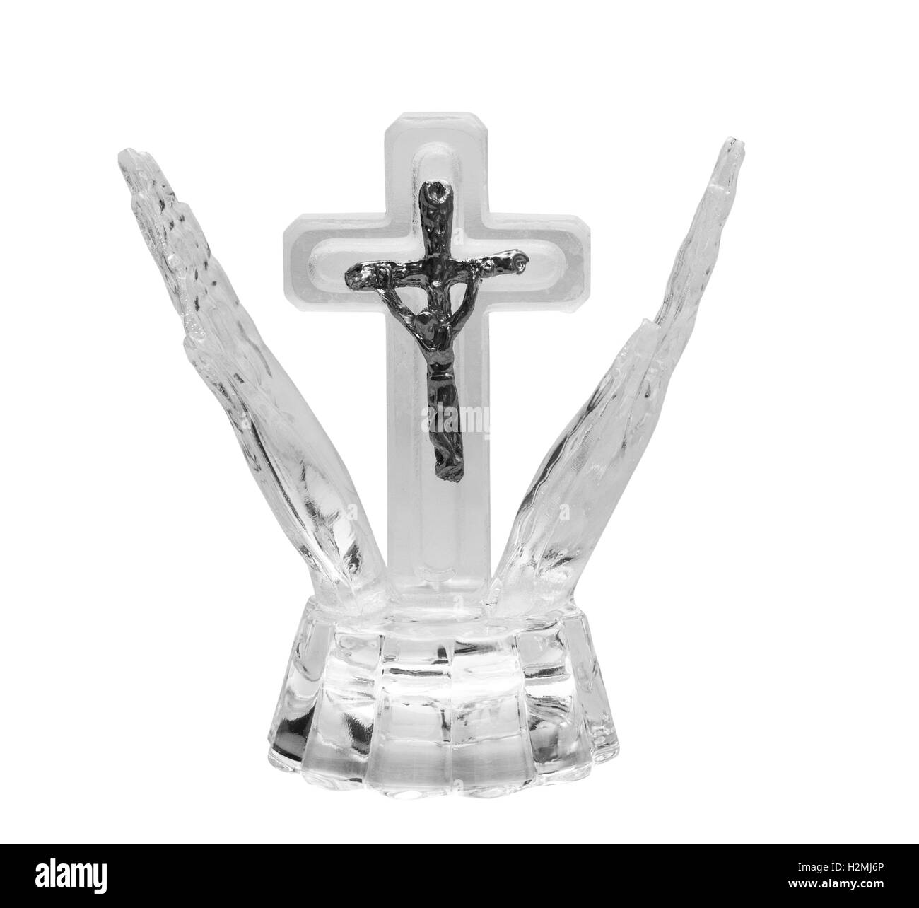 Jésus sur la croix dans le verre isolé sur fond blanc Banque D'Images