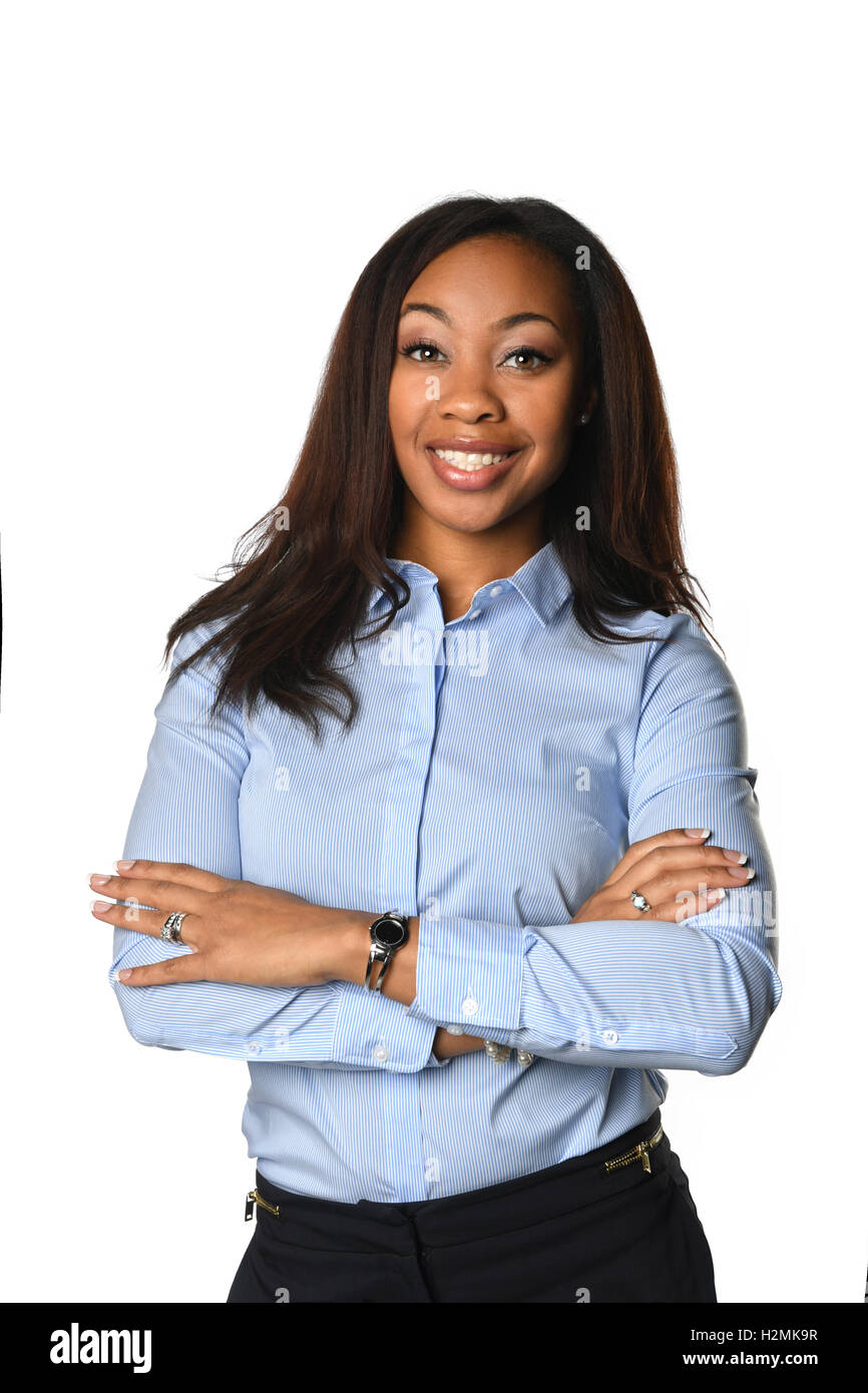 Portrait of African American businesswoman smiling with arms crossed over white background Banque D'Images