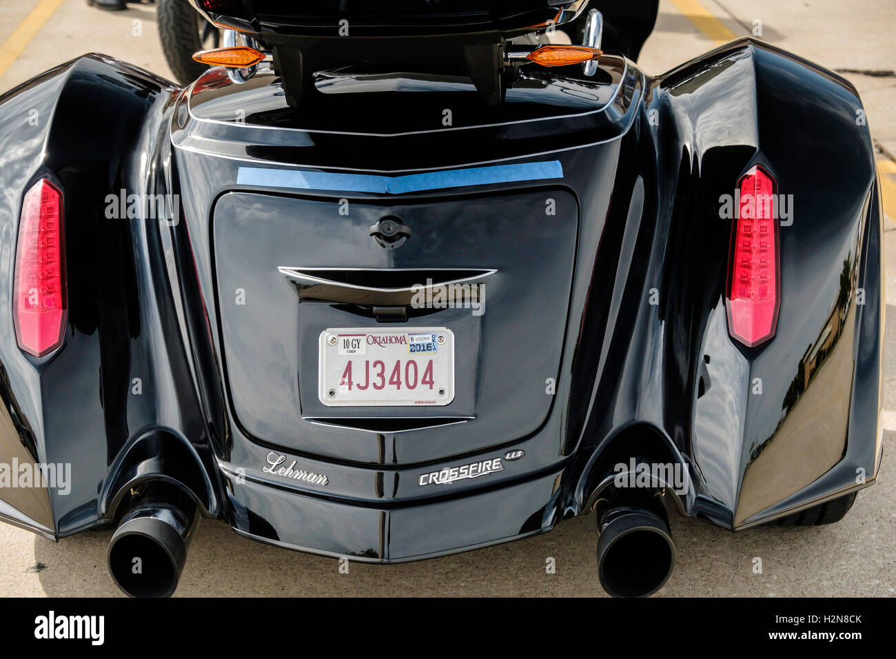 La vue arrière d'un tricycle à la victoire a fait. Banque D'Images