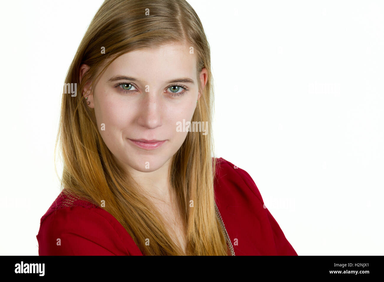Portrait d'une jolie blonde woman wearing red. Banque D'Images