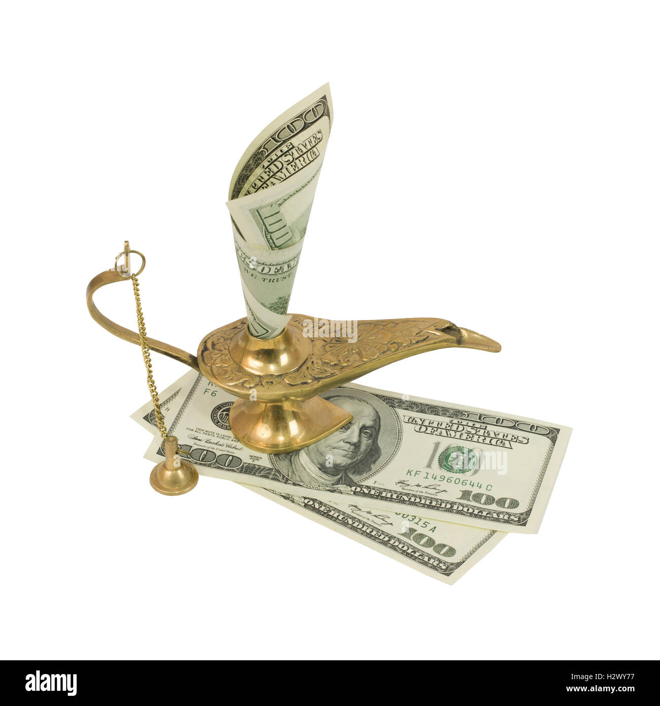 Dollar bill sticking out of lampe magique d'Aladin Banque D'Images