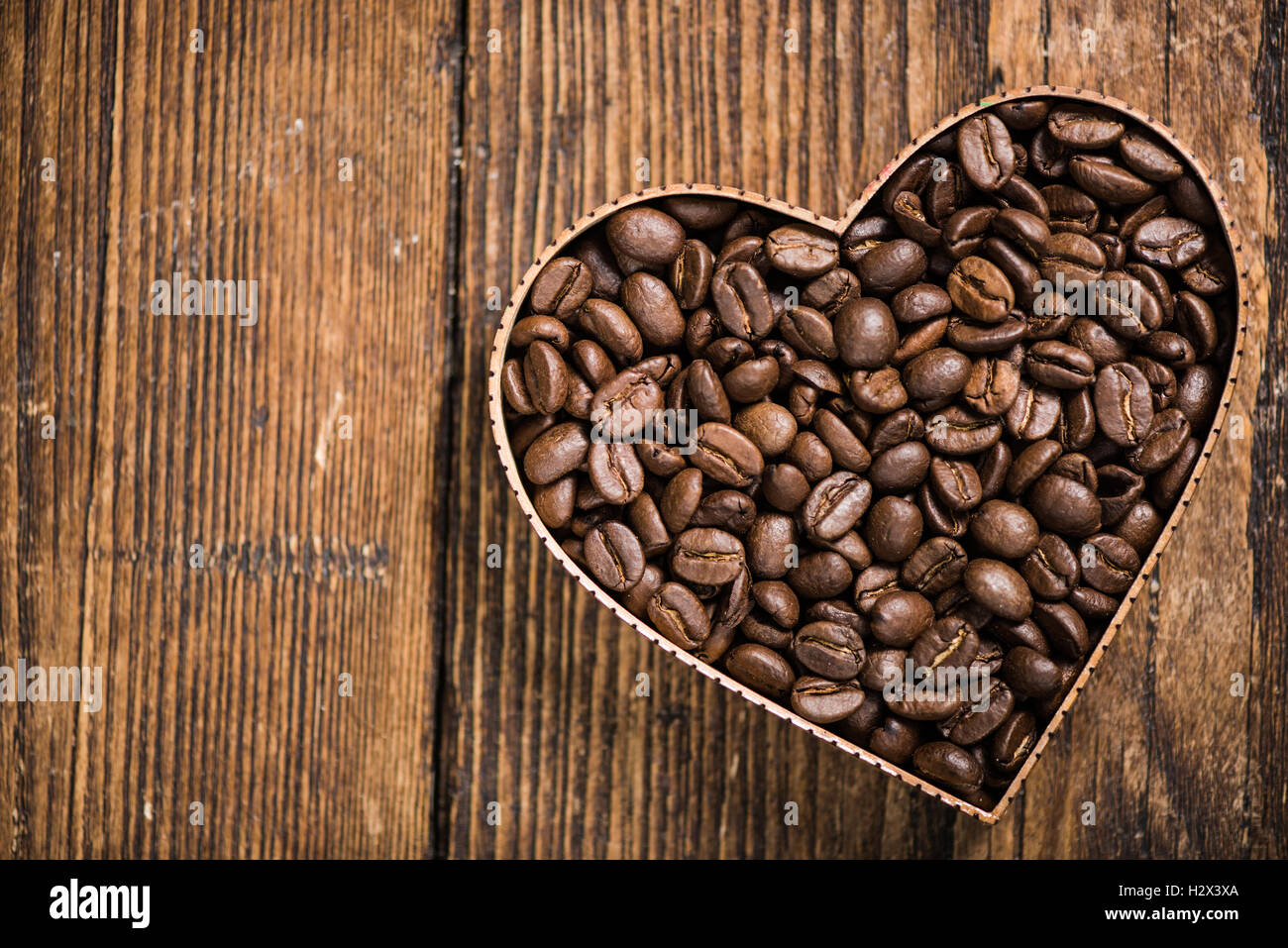 L'amour pour le café, les haricots dans roasten symbole en forme de coeur Banque D'Images