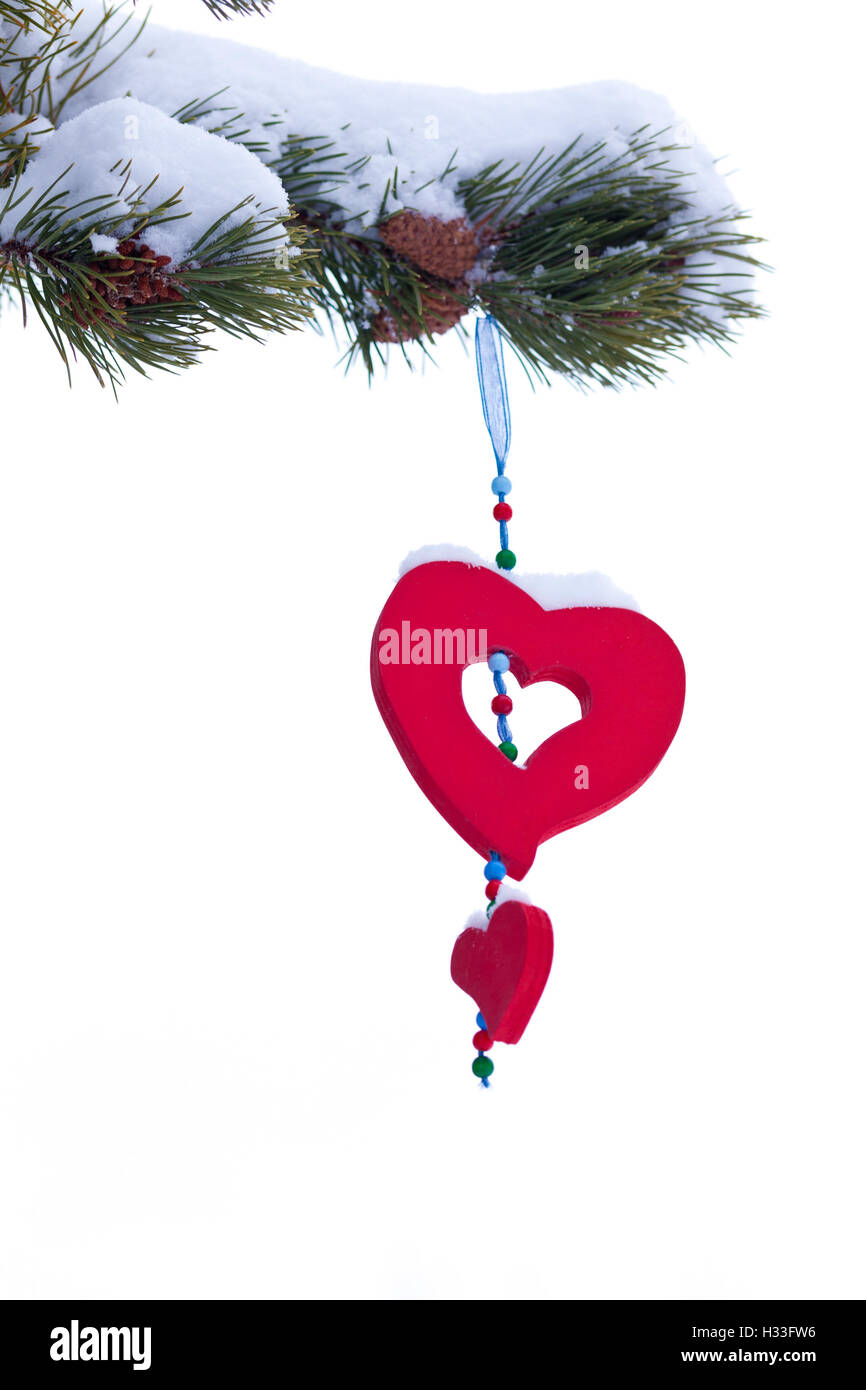 Snowy Christmas Tree ornament coeur rouge isolé Banque D'Images Snowy Christmas Tree ornament coeur rouge isolé Banque D'Images
