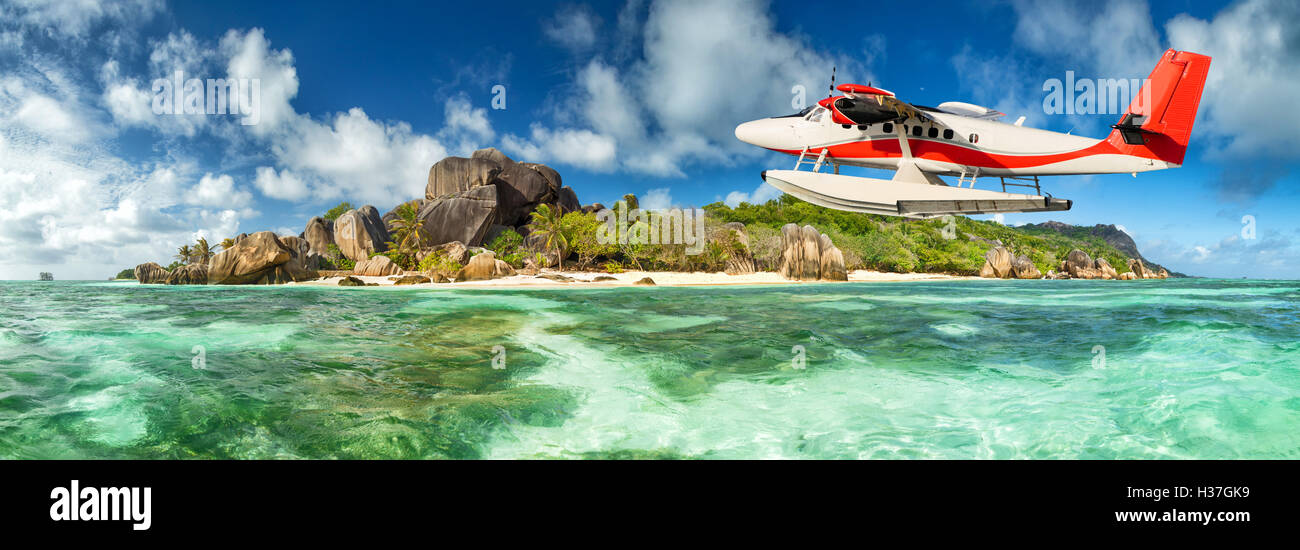 Belle plage tropicale Seychelles Anse Source d'argent à l'île de La Digue avec le vol seaplane Banque D'Images