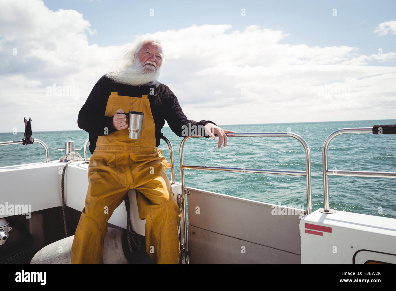 Tasse de café potable pêcheur Banque D'Images