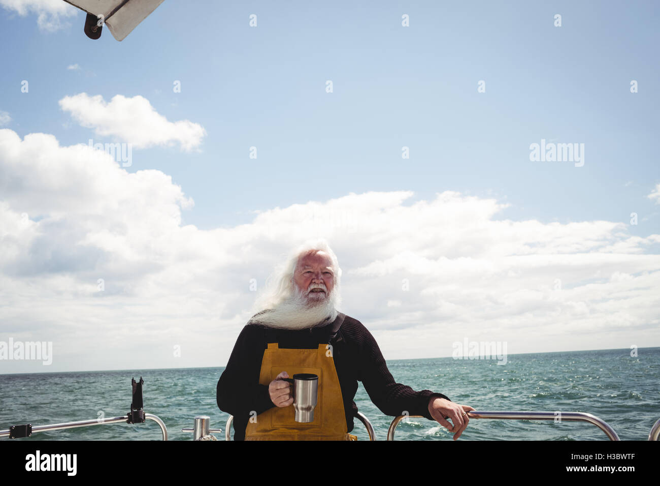 Tasse de café potable pêcheur Banque D'Images