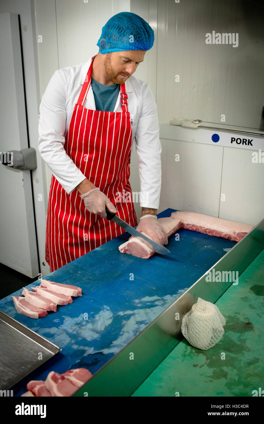Boucher la viande en tranches Banque D'Images