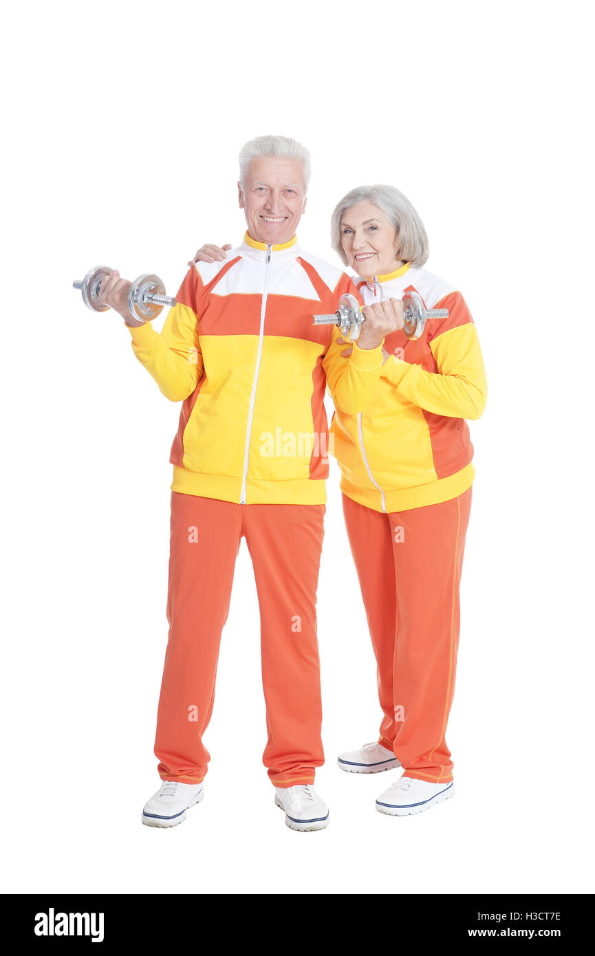 Senior Couple Exercising with dumbbells Banque D'Images