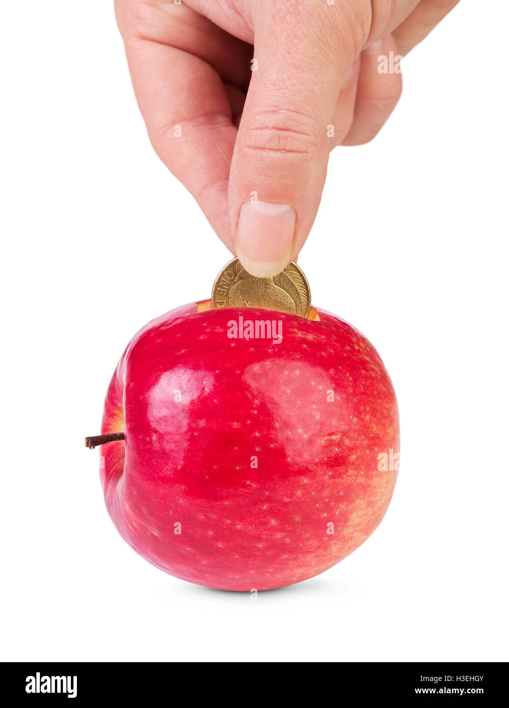 Fresh apple comme tirelire et part avec coin isolé. Concept de vie sain investissement . Banque D'Images