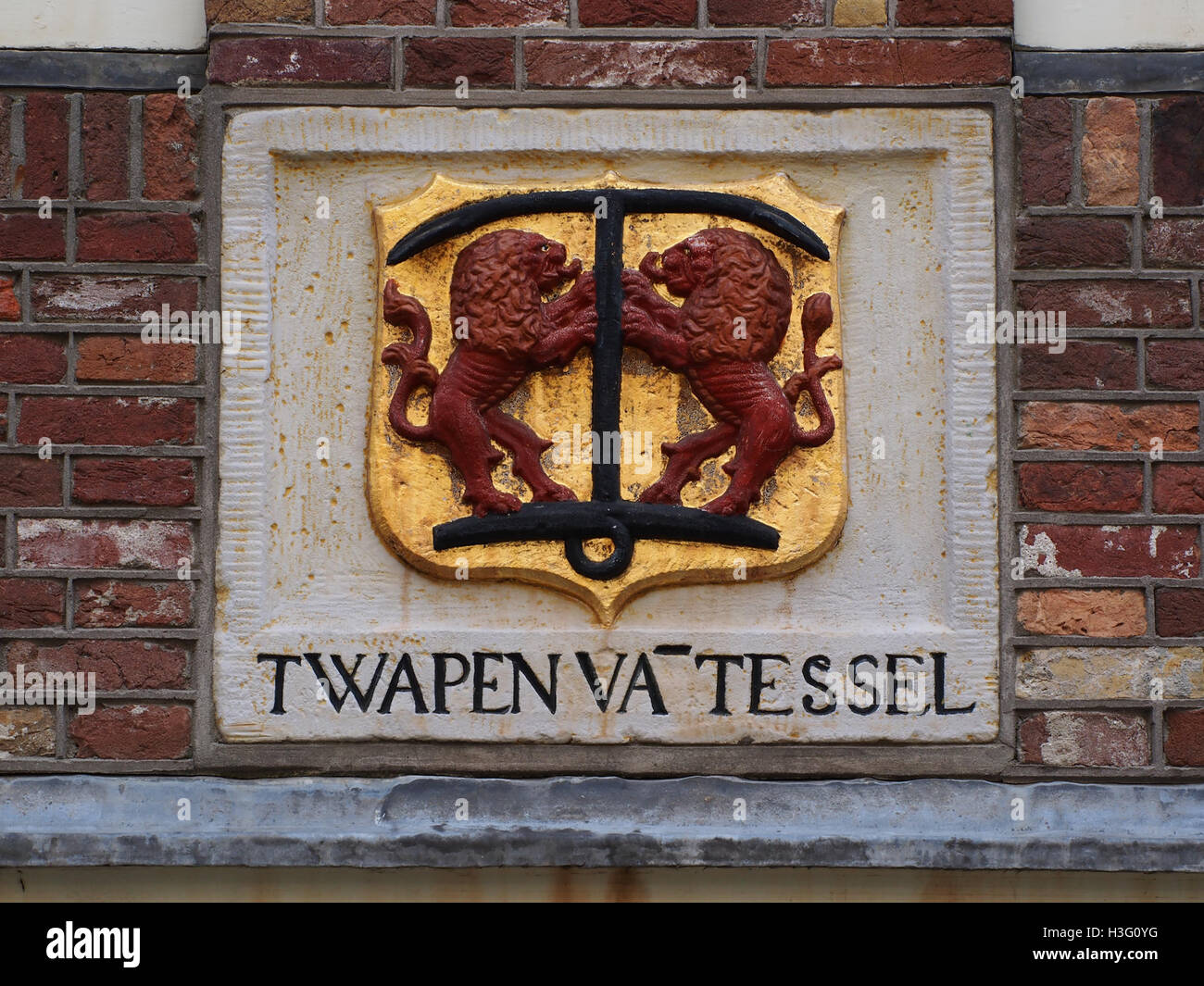 Binnen Oranjestraat gevelsteen, 3 T WAPEN VA TESSEL Banque D'Images