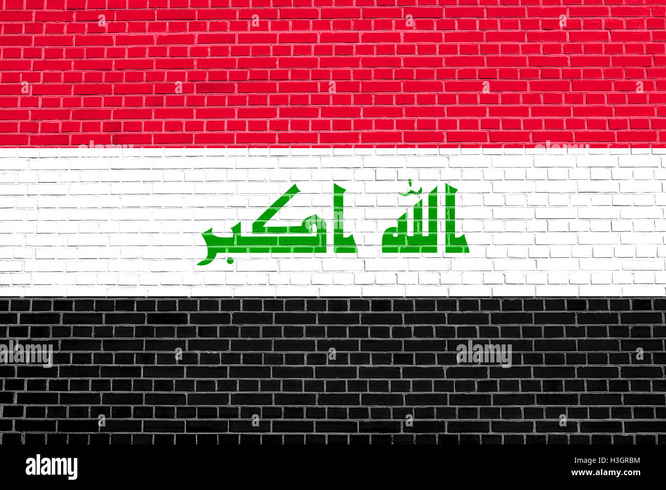 Drapeau officiel national irakien. Irak symbole patriotique, l'élément, l'arrière-plan. Iraki bannière. Pavillon de l'Iraq le brick wall texture Banque D'Images