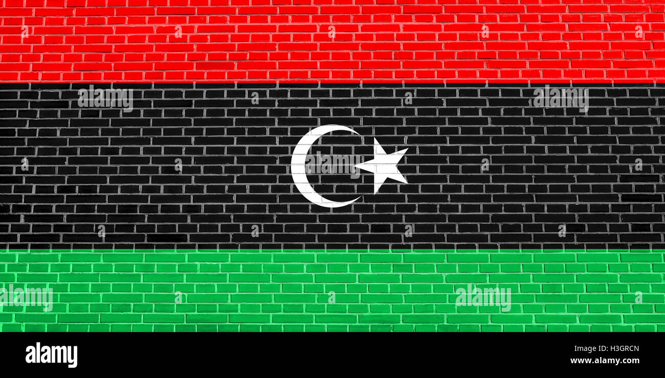 Drapeau officiel national libyen. Symbole patriotique africaine, bannière, élément, arrière-plan. Drapeau de la Libye sur la texture du mur de brique Banque D'Images