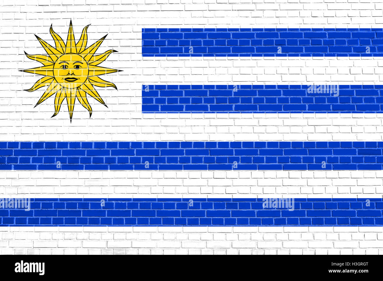 Drapeau officiel national uruguayen. Symbole patriotique, bannière, élément, arrière-plan. Pavillon de l'Uruguay sur le brick wall texture Banque D'Images