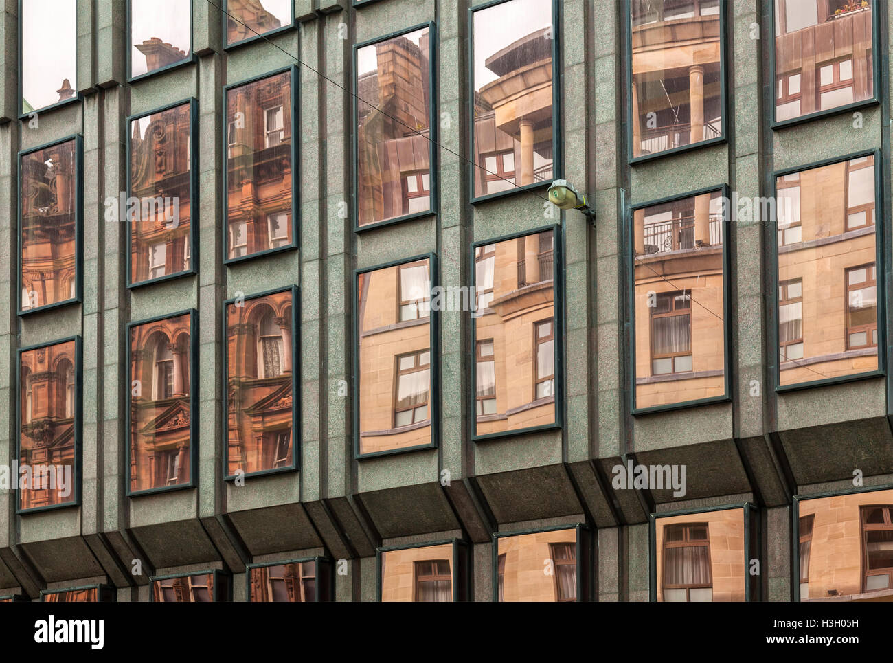 Droit de bâtiments compte dans windows. Ville de Glasgow, en Écosse. Banque D'Images