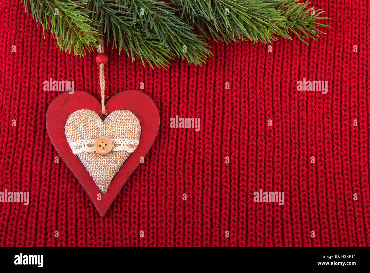 Fond de Noël dans une ferme de style. Vintage laine rouge fond rustique pour célébration de Noël. Banque D'Images