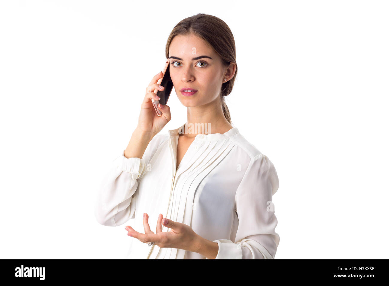 Femme parlant au téléphone Banque D'Images