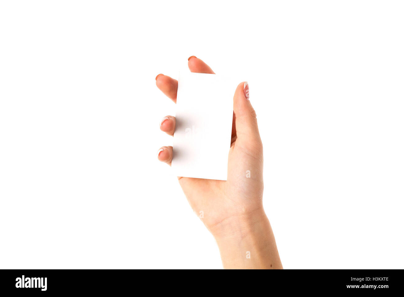 Woman's hand holding white card Banque D'Images