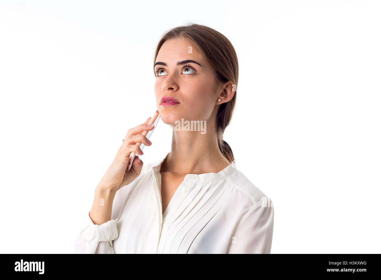 Femme tenant son téléphone Banque D'Images