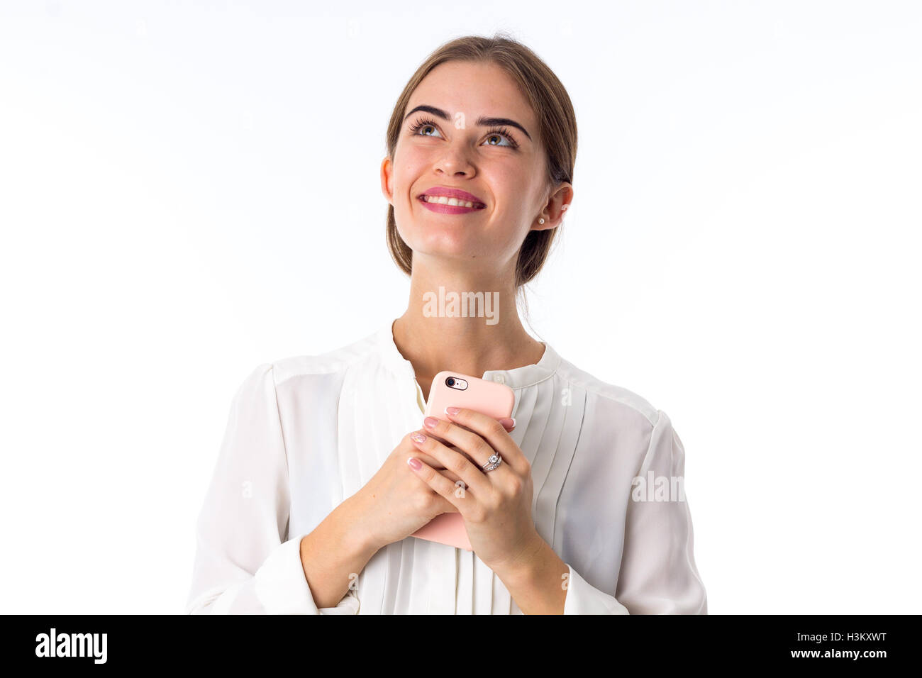 Young smiling woman en blouse blanche Banque D'Images
