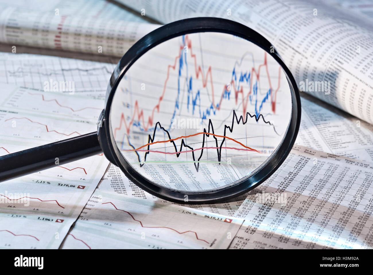 Loupe présente la variation des prix des actions, Banque D'Images
