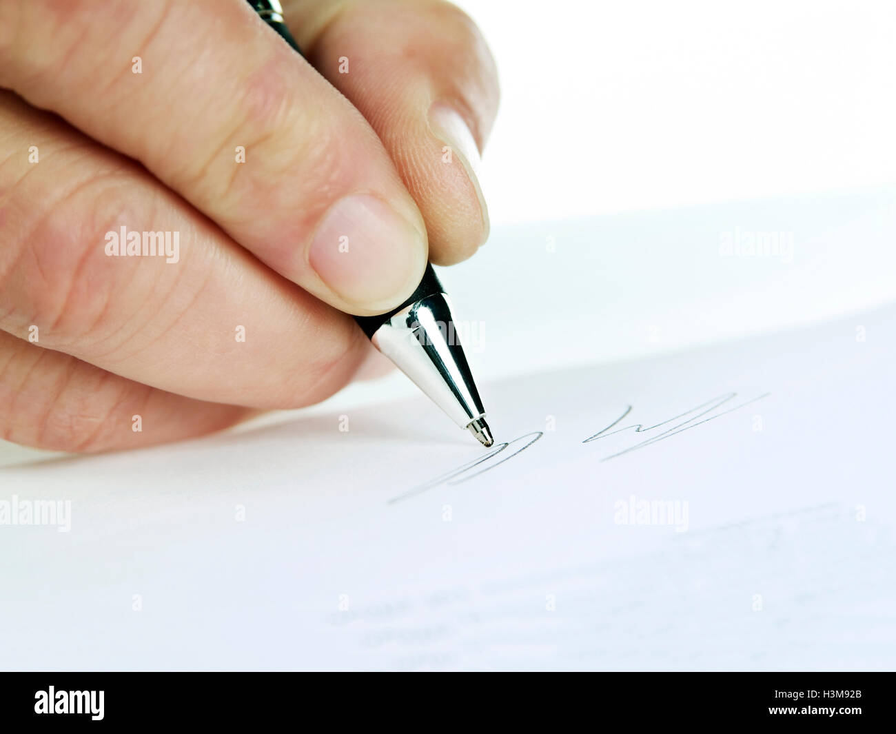 Close-up d'une main tout en signant Banque D'Images