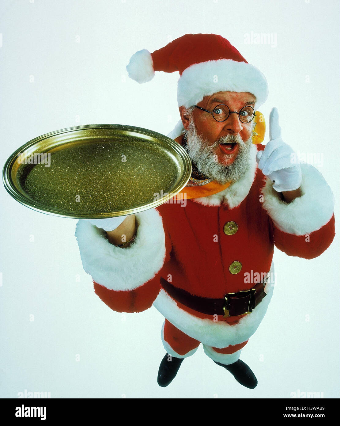 Santa Claus, tablette, Golden, le geste, l'attention, tout point, jouer du visage, l'homme, le Père Noël, Noël, présentation, index, l'attention, astuce, studio, cut out Banque D'Images