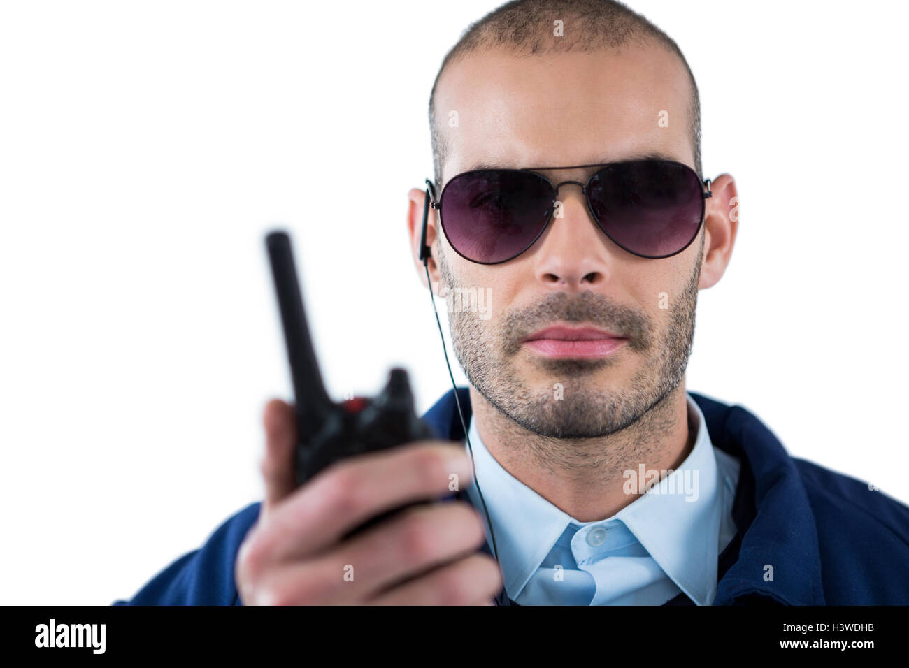 Beau parler d'agent de sécurité sur le talkie-walkie Photo Stock - Alamy