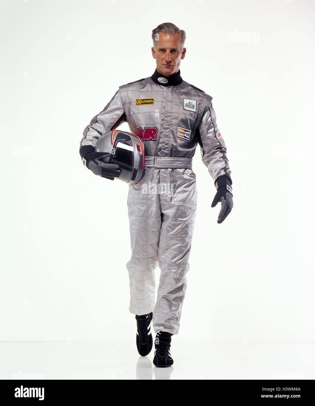 Le sport automobile, pilote de course, dans l'ensemble, casque, argent, motion, go sport, sport de course, l'homme, combinaison de course, casque, casque de sécurité, casque, gants, studio, head-on, Banque D'Images
