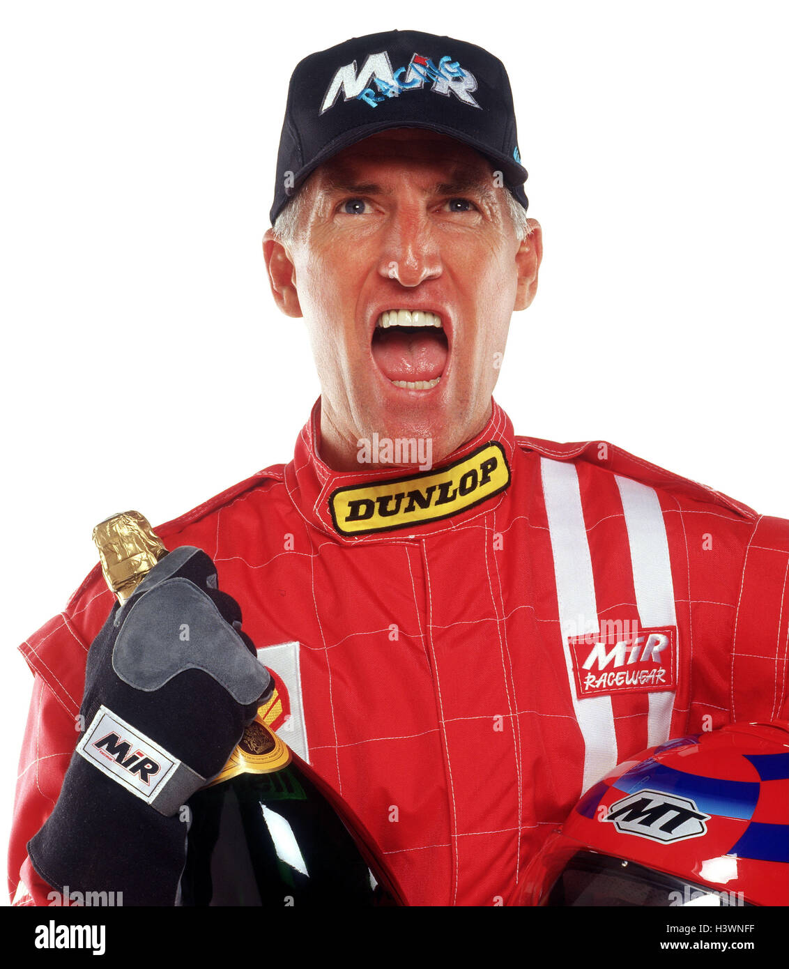 Le sport automobile, pilote de course, dans l'ensemble, le rouge, bouchon, bouteille de vin mousseux, jouer du visage, de la joie, ils applaudissent, victoire, portrait, sport, sport de course, l'homme, succès, gagnant, premier, champagne, réjouissez-vous, svp, il y triomphe, triomphe, studio, près de, découpe, Banque D'Images