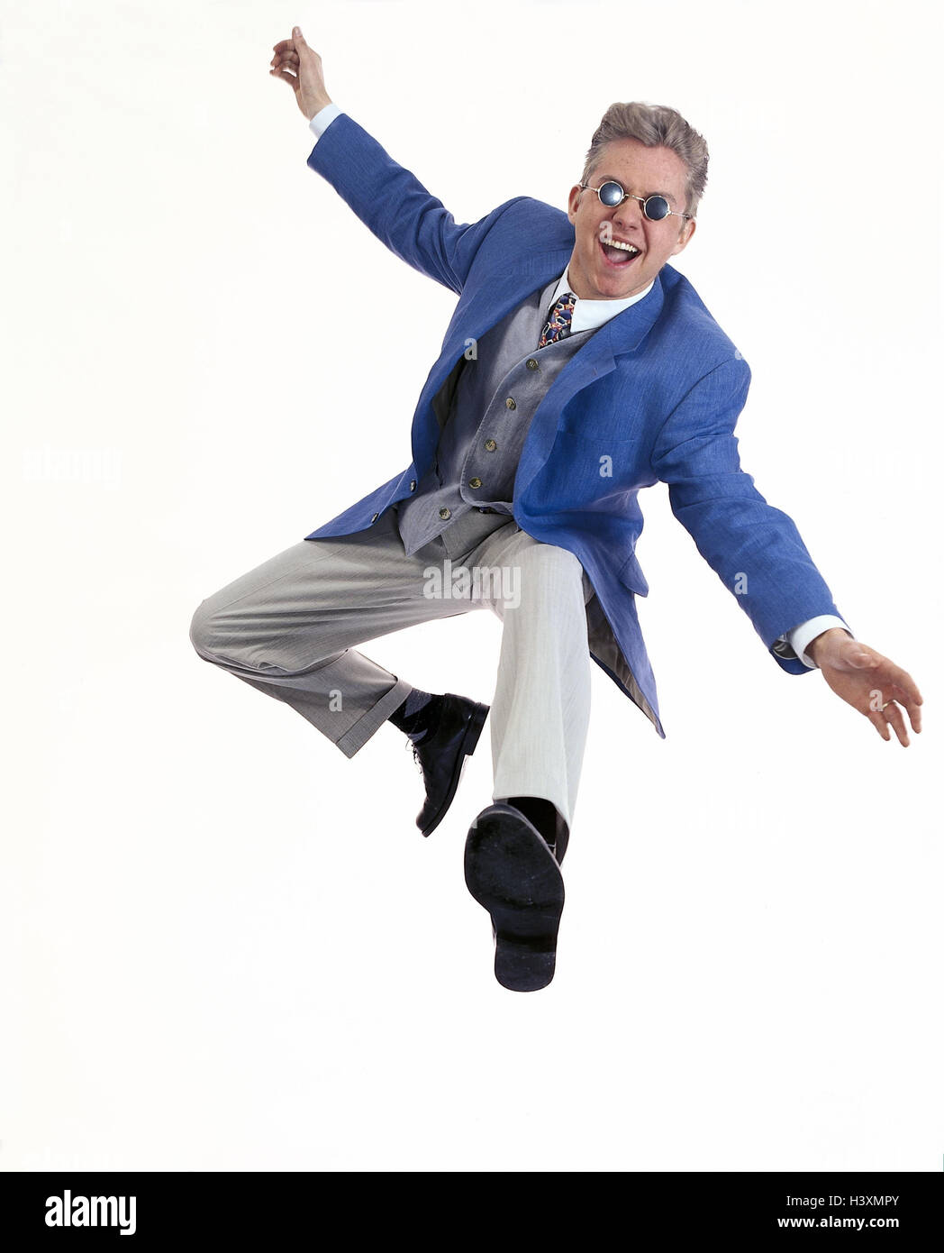 L'homme, jeunes, poursuite, lunettes, caper, studio mb 154 A1 Banque D'Images