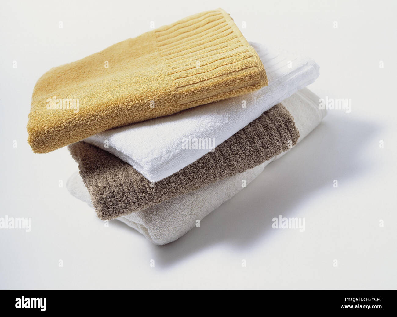Serviettes, couleurs, est décédé, chiffons éponge empilés, serviettes en éponge, les lots, les uns sur les autres, l'ordre, replié, textiles, textiles, produits ménagers, la photographie, la nature morte, studio Banque D'Images