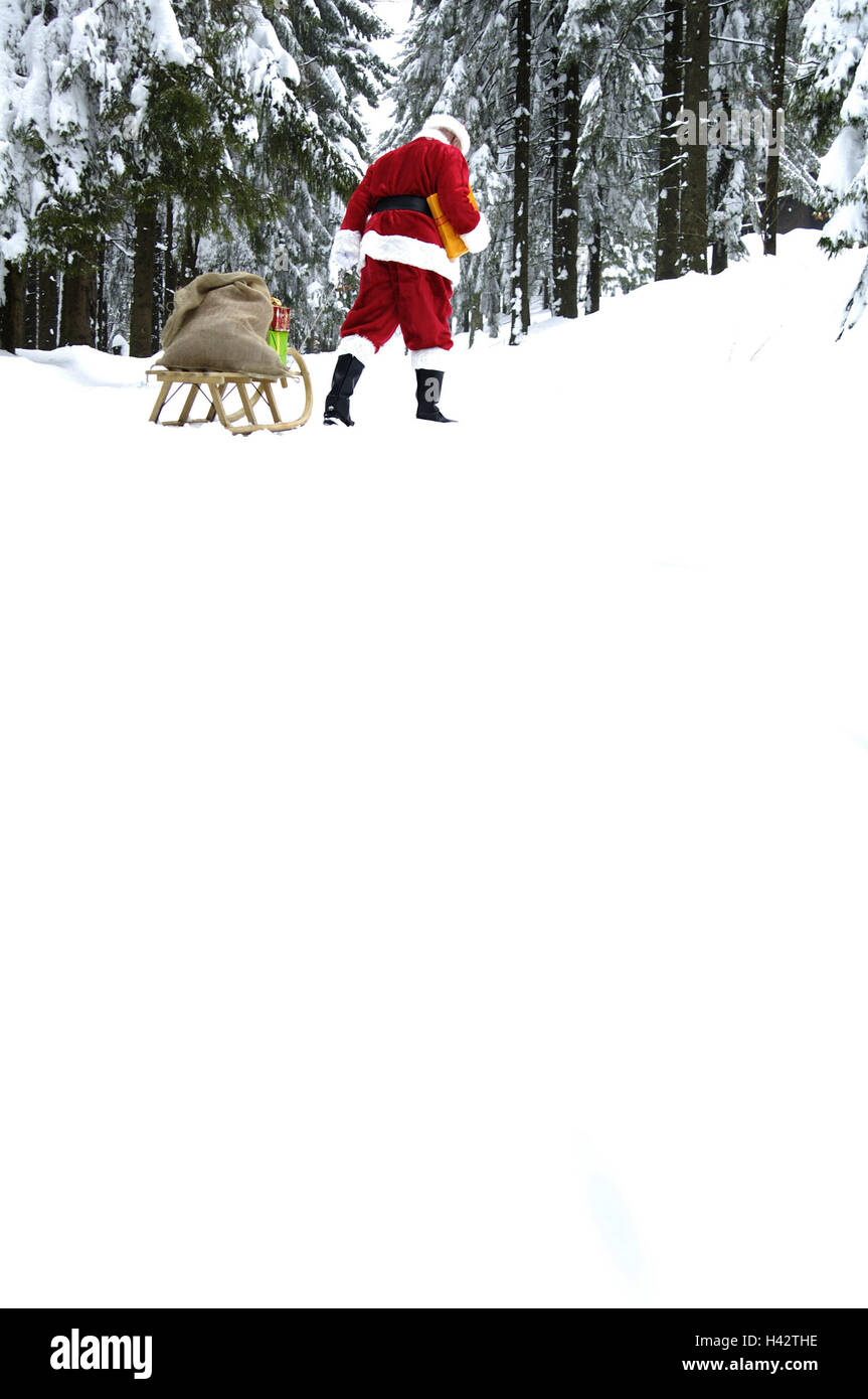 Forêt d'hiver, le Père Noël, traîneau, Sack, cadeaux, vue de dos, Banque D'Images