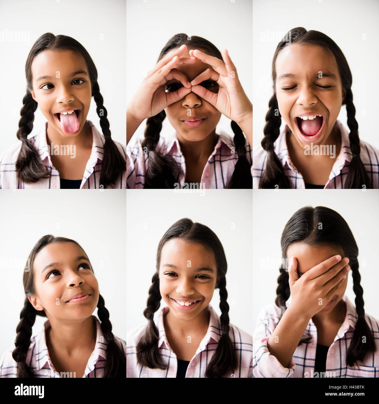 Série de Mixed Race girl making faces Banque D'Images