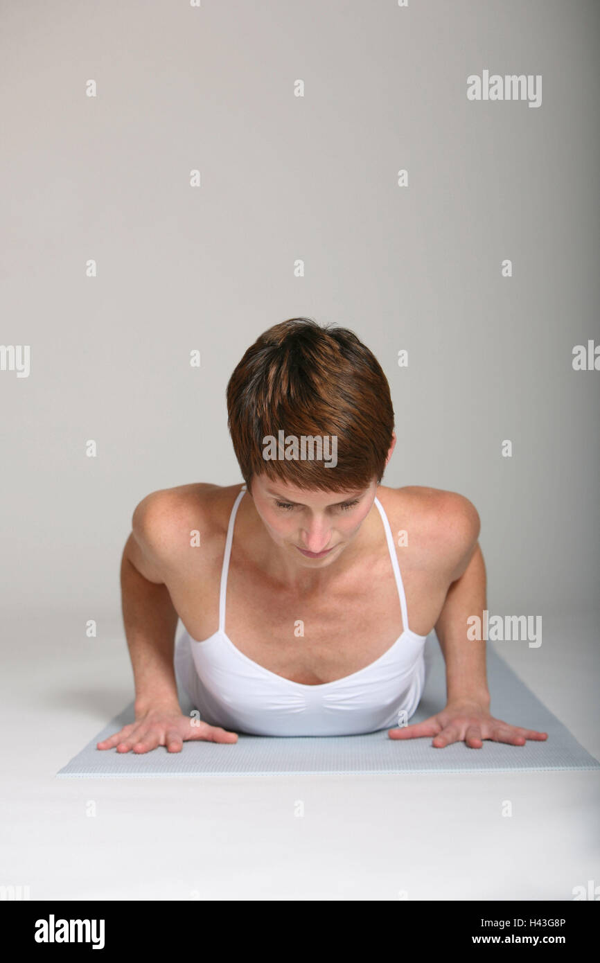 Femme, jeune, marbre, le mensonge, l'exercice de yoga, Banque D'Images
