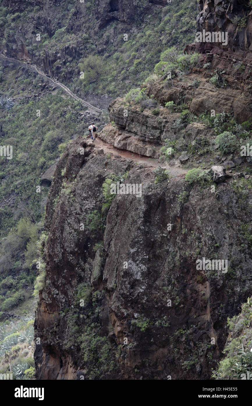 L'Espagne, les Canaries, l'île La Gomera, Imada, Barranco de Guarimiar, de ravin, rock, Wanderer, paysage, nature, rock, gorge, montagne, voyage, repas, peu abondantes, la végétation, les plantes, fortement, personnes, locations, tourisme, randonnée pédestre, sentier, Banque D'Images