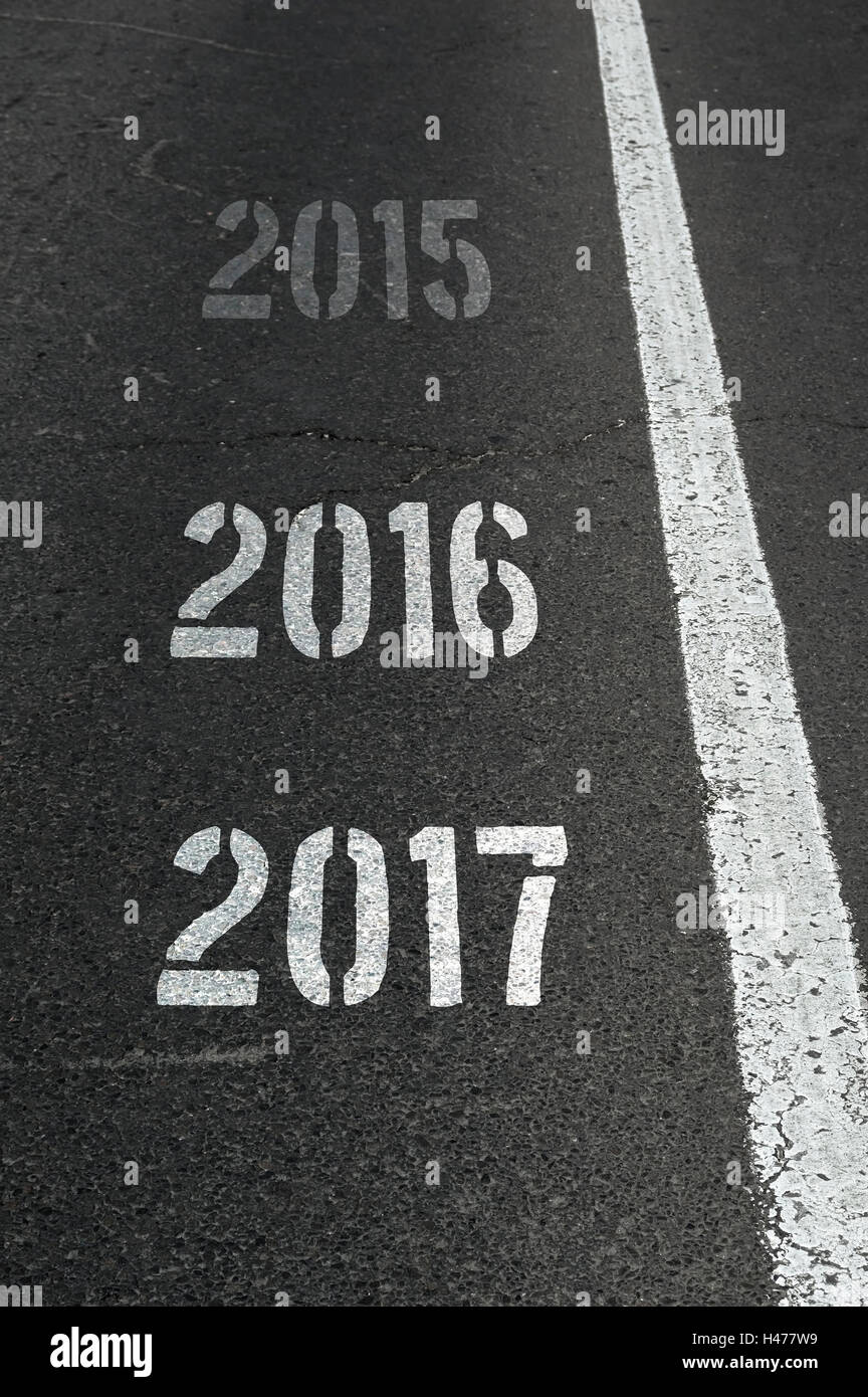 2017, Bonne Année, les numéros de l'année compter sur route asphaltée, selective focus Banque D'Images