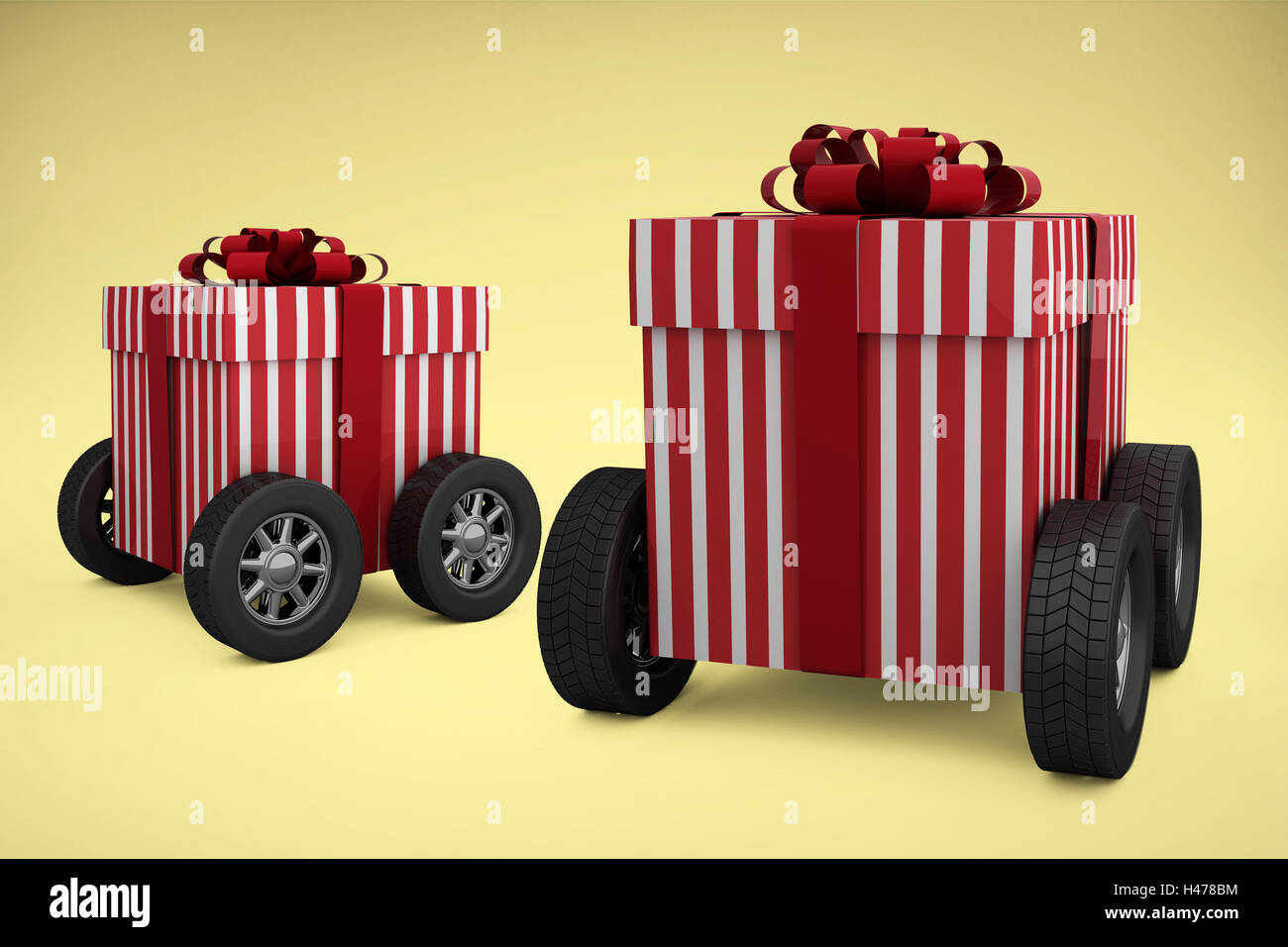 Image composite du bar rayé rouge et blanc boîte-cadeau avec roues Banque D'Images