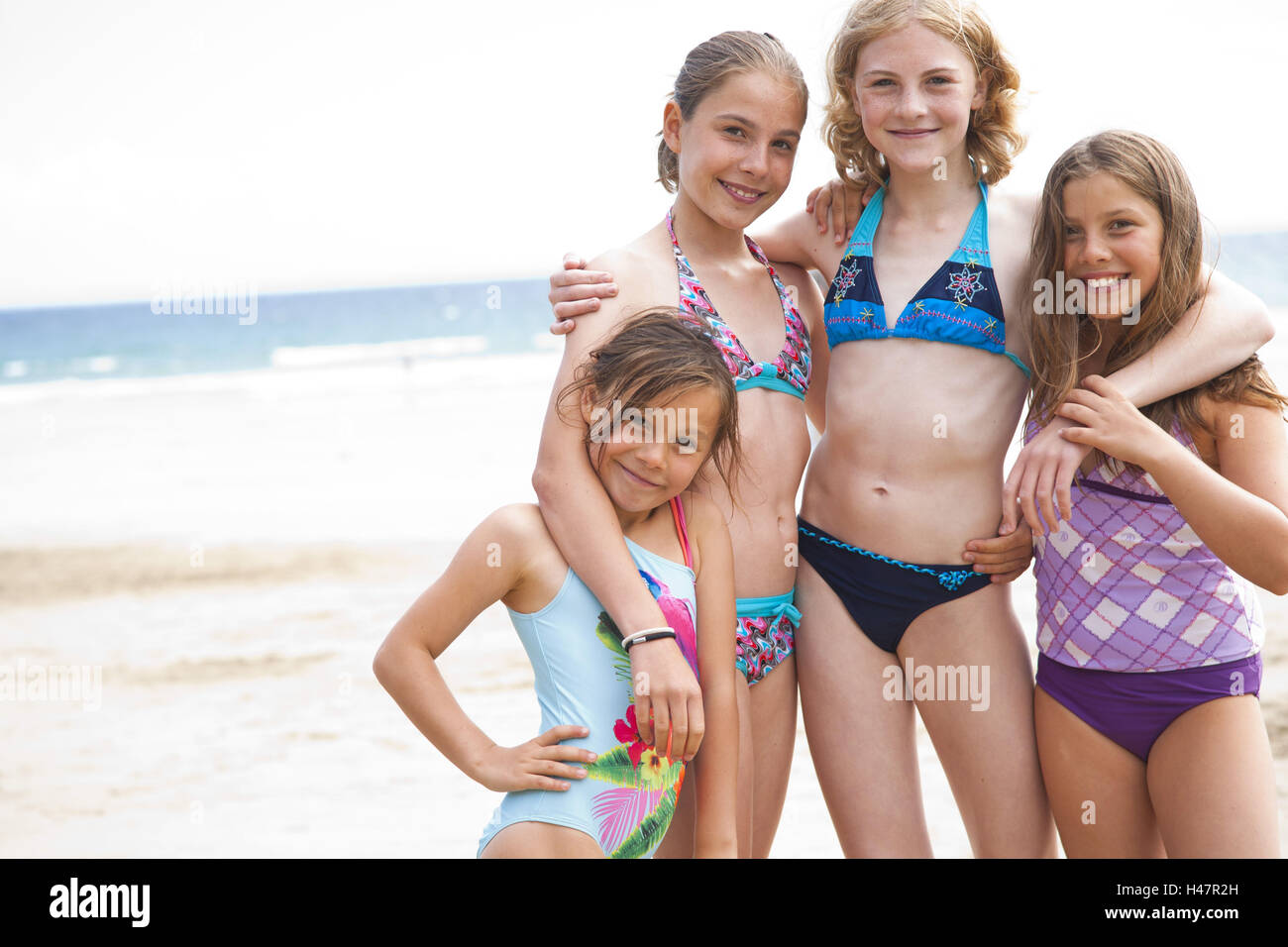 Les filles sur la plage, photo de groupe Photo Stock Alamy