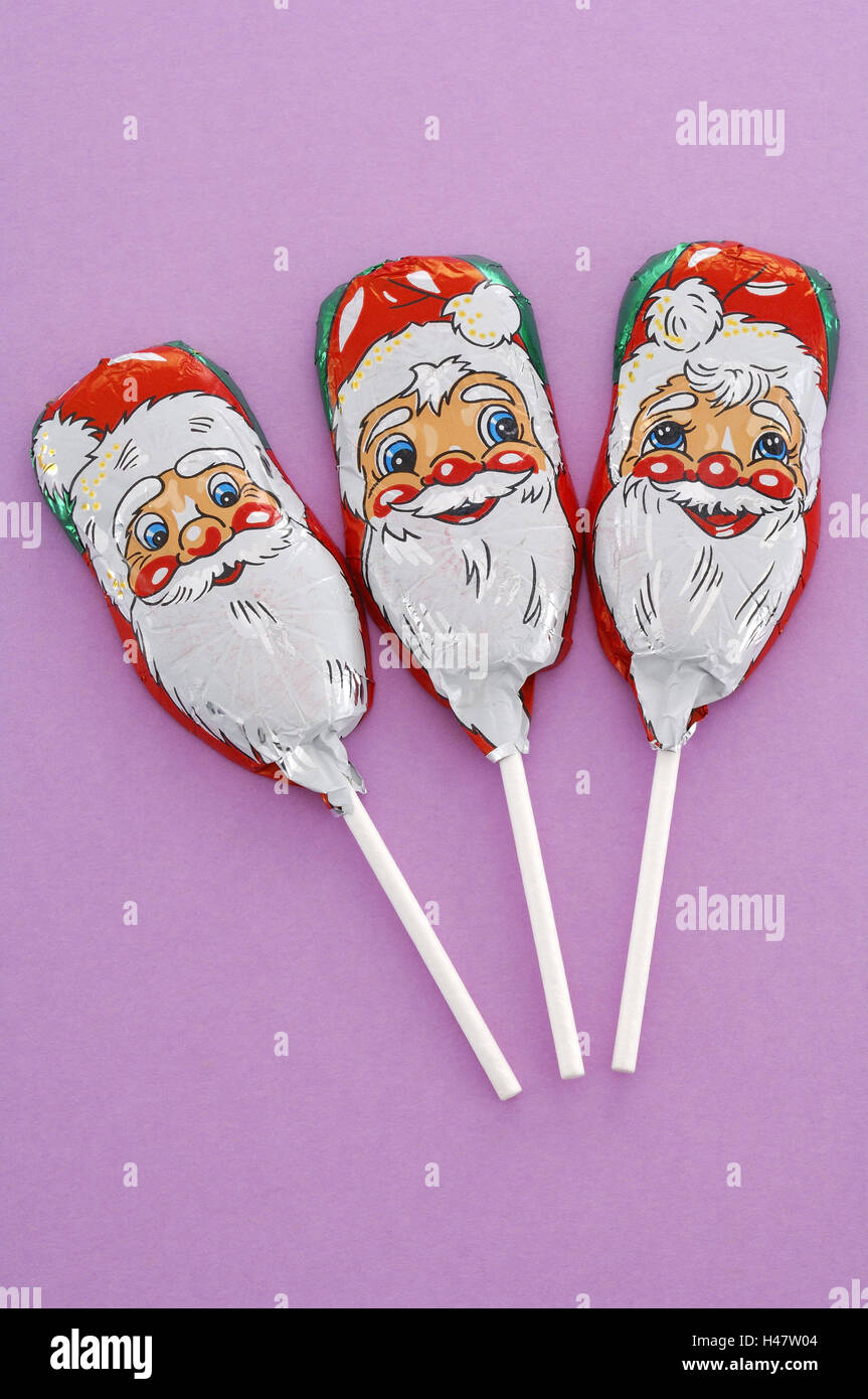 Santas chocolat, sucettes Banque D'Images