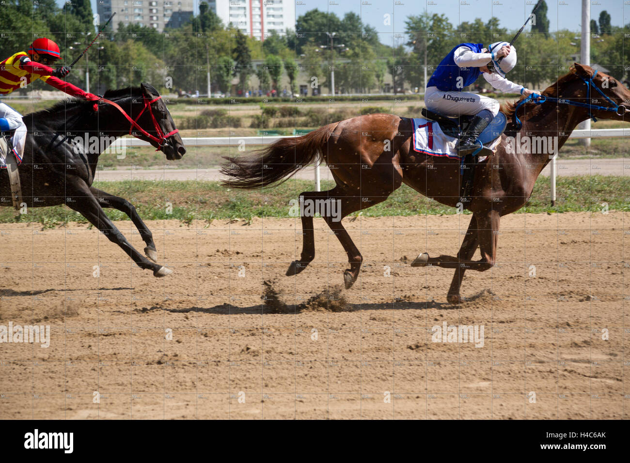 Les participants des courses de chevaux à l'Hippodrome central de Moscou, Russie Banque D'Images
