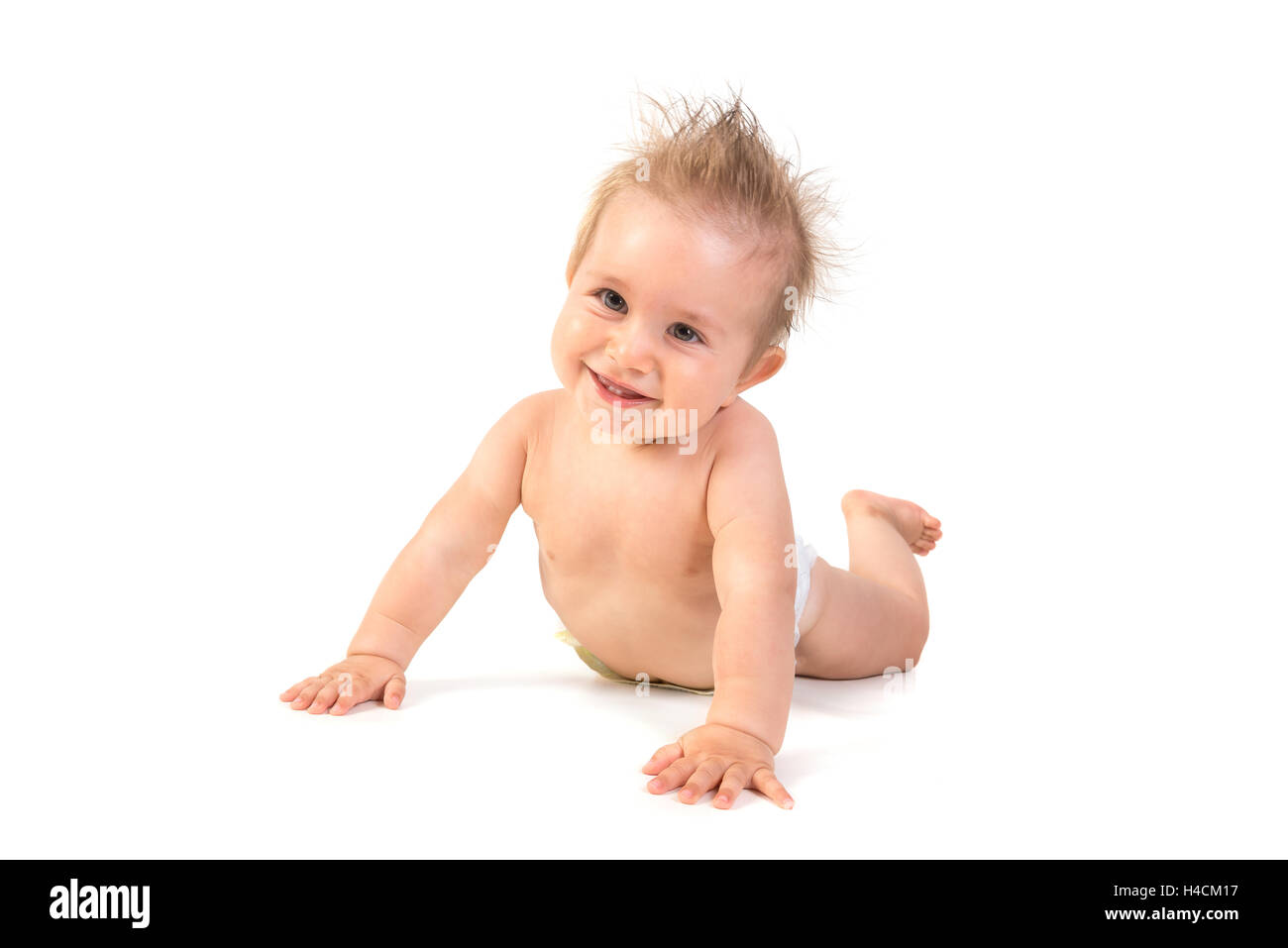 Magnifique petit garçon posant isolé en fond blanc Banque D'Images